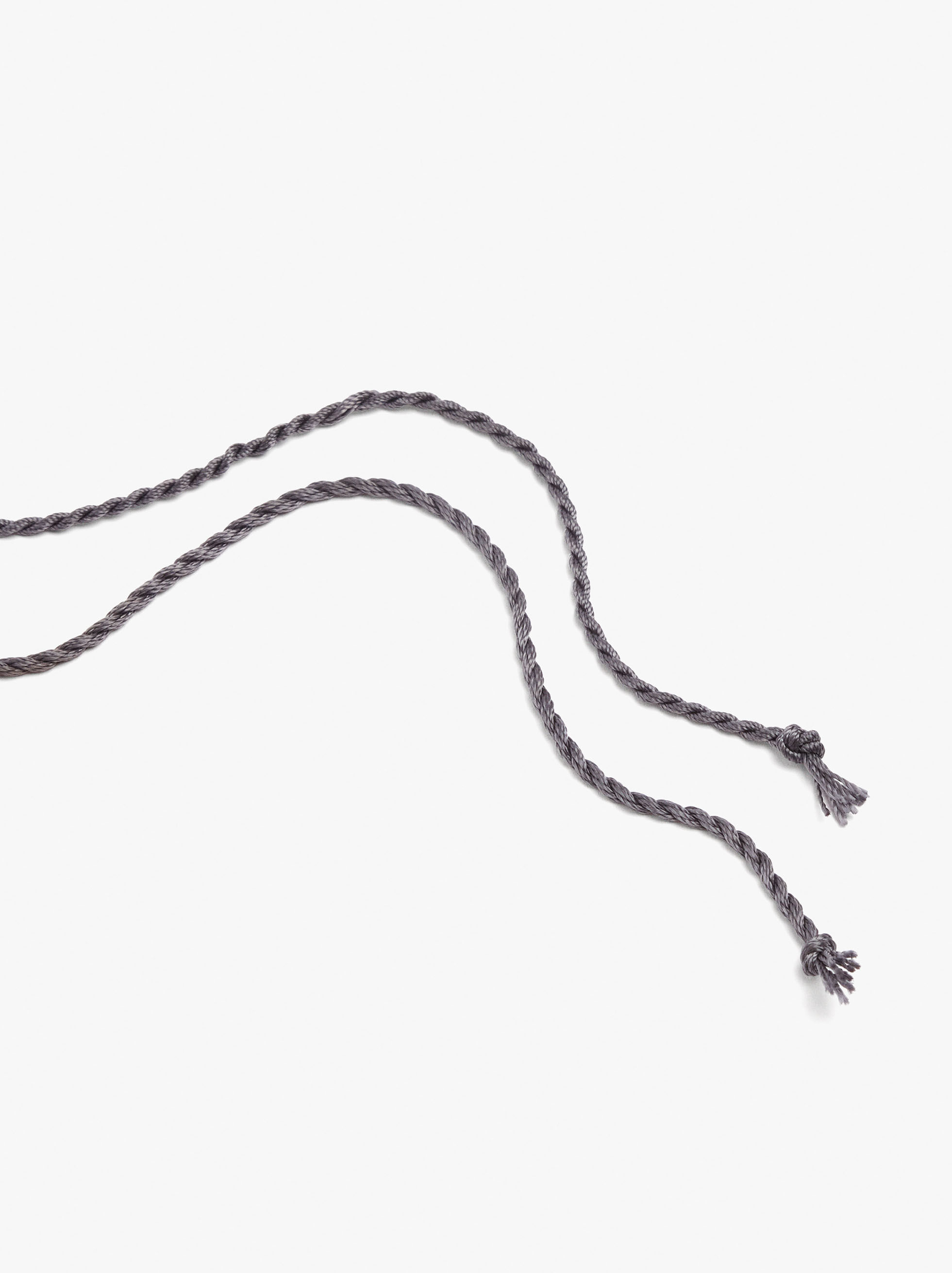 Ankle bracelet with jingle cord