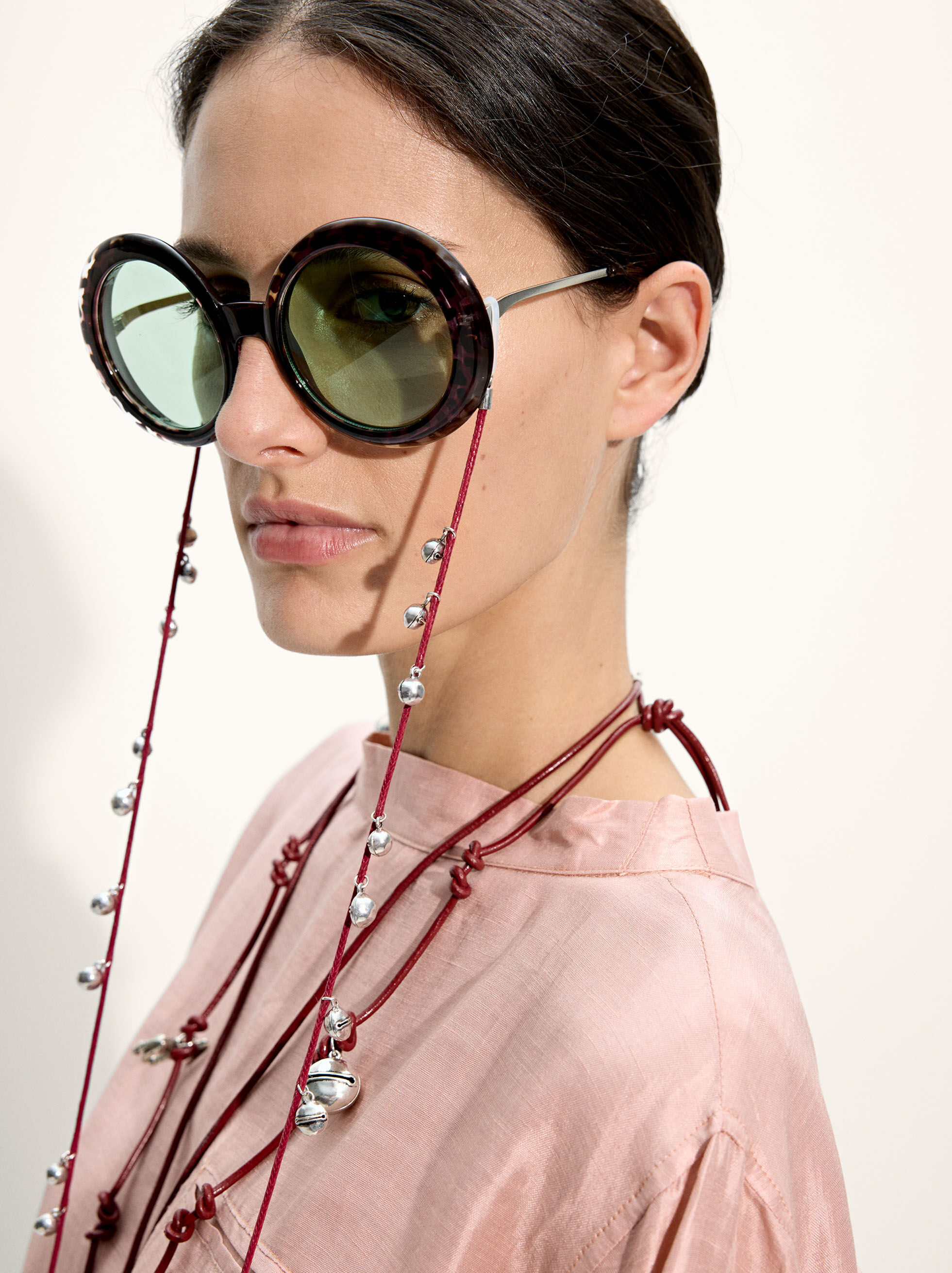 Glasses strap with jingles
