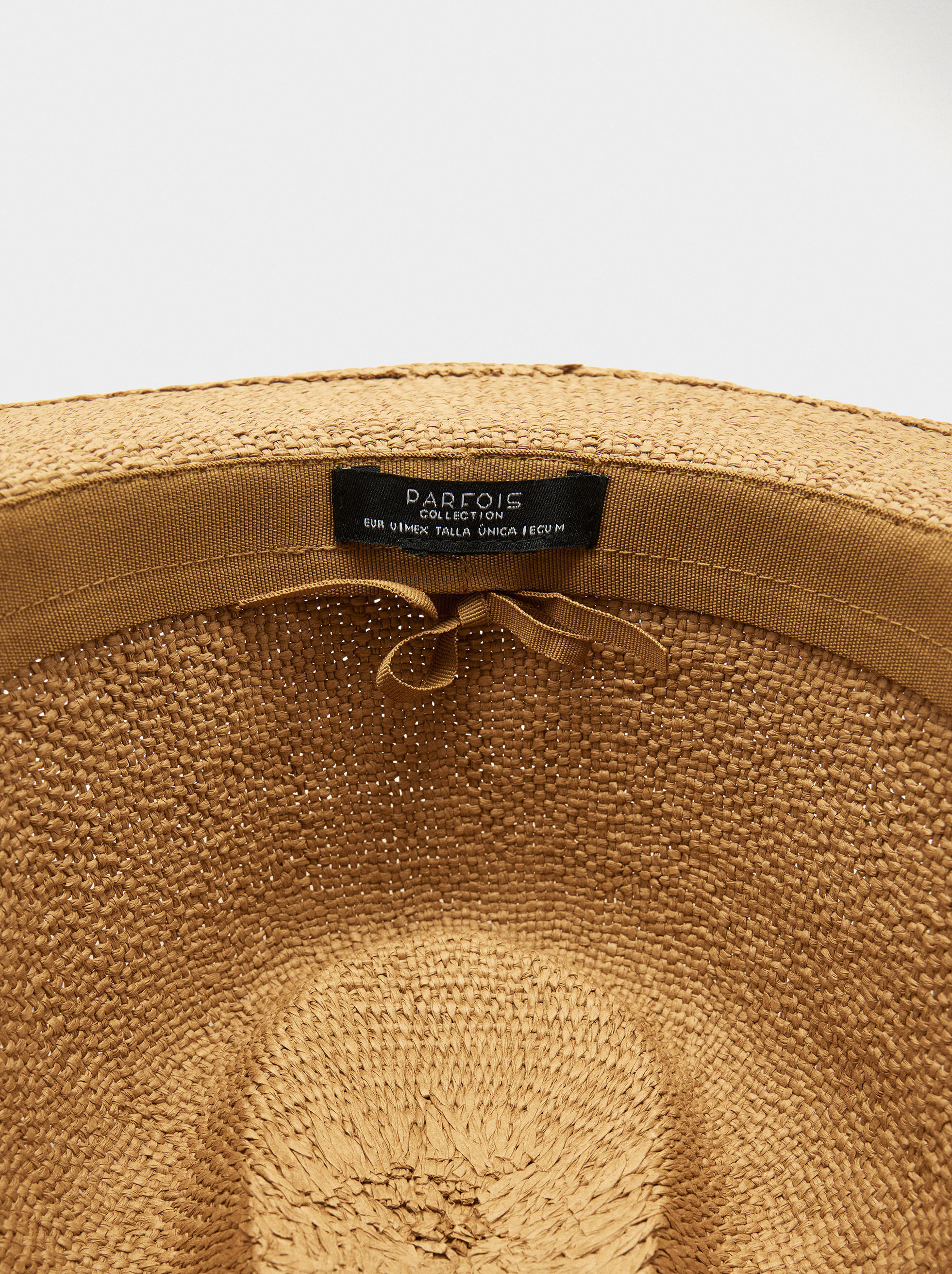 Straw-effect hat with cord and charms