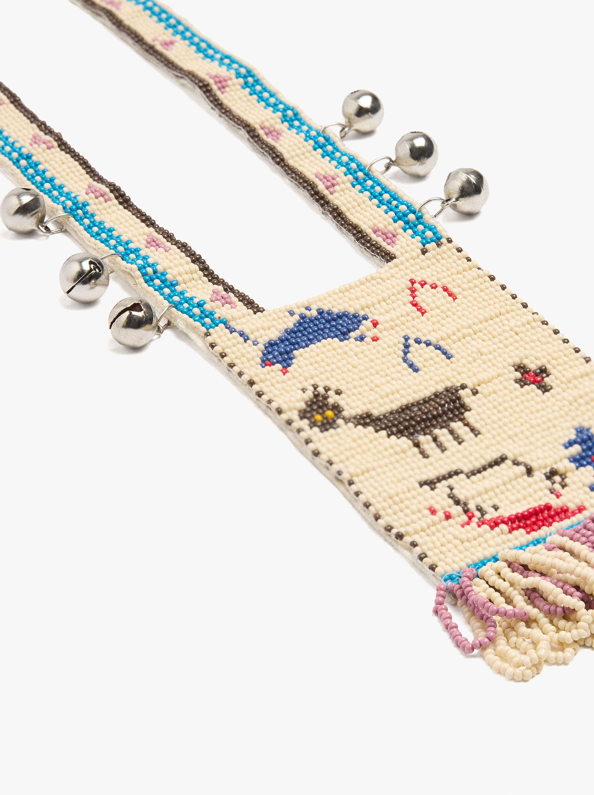 Long necklace with glass beads and jingles